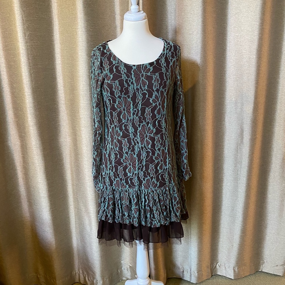 Very fun and flattering lace overlay dress.
